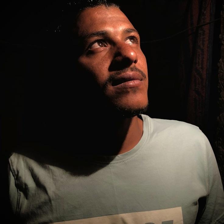 Kaveri Mehta, Lead Design Curator at Plume Azure Fern, reviewing corporate floral arrangements